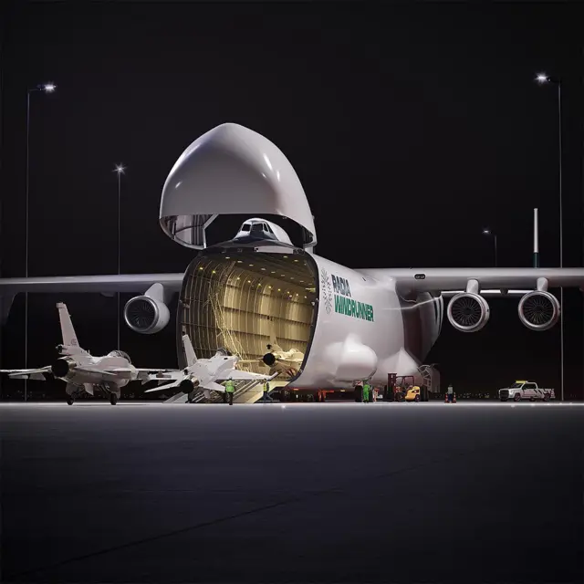Imagen conceptual que muestra un avión WindRunner siendo cargado con aviones caza.