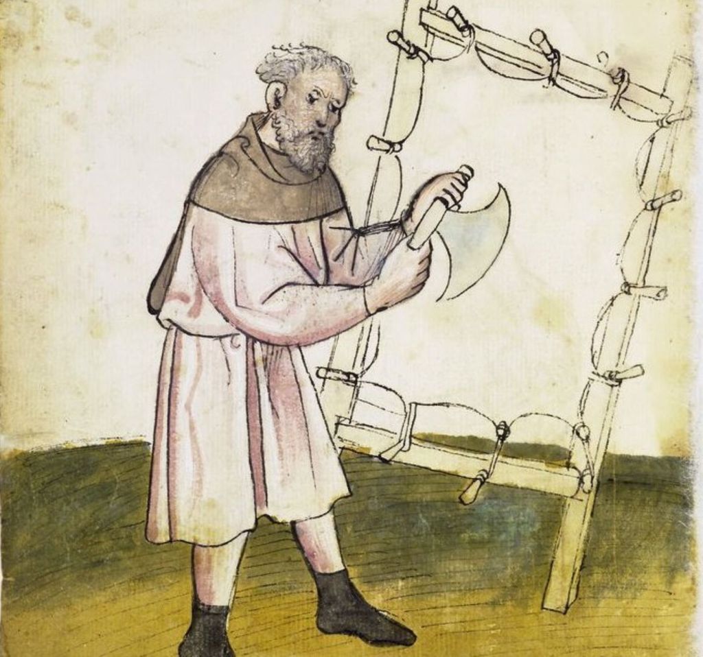 Preparación del pergamino en una ilustración del siglo XV