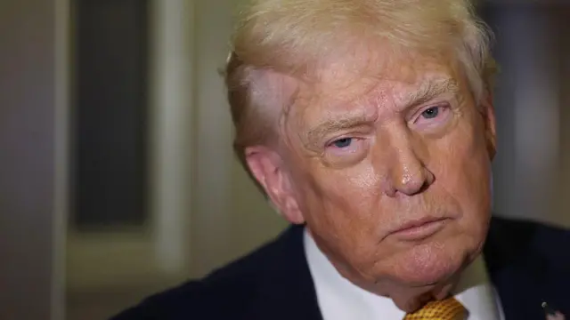 Donald Trump, fotografiado durante un encuentro con medios de comunicación este domingo 4 de enero.