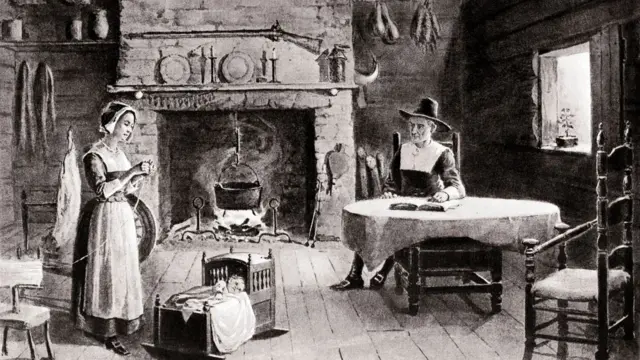 Interior de la cabaña de una casa pionera de la década de 1640. Hombre, mujer y bebé en una cuna. Chimenea familiar. Peregrino y puritano. Nueva Inglaterra colonial.