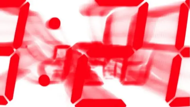 Números rojos superpuestos en una pantalla digital